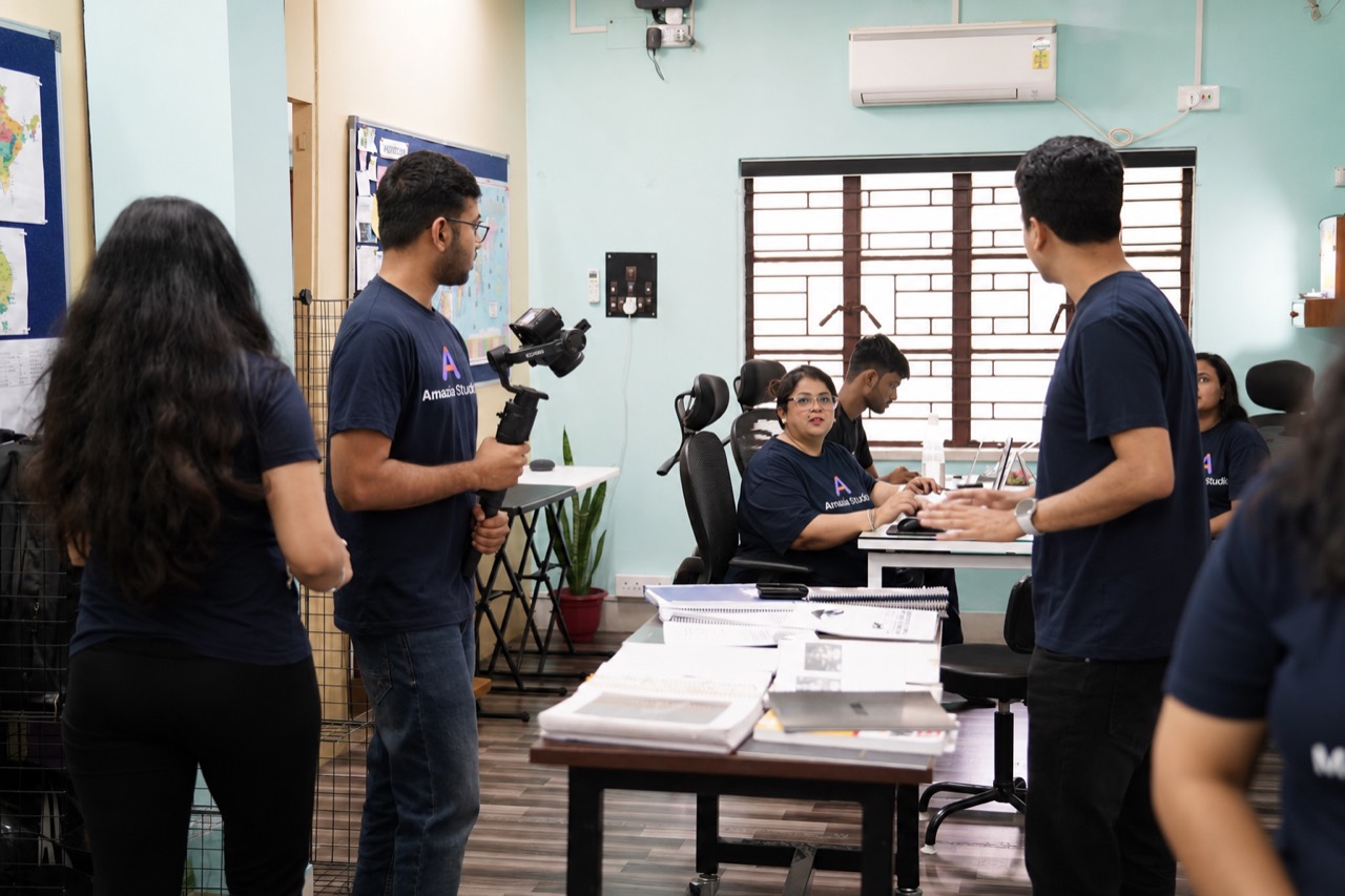 The Amazia Studio team at work together in the studio